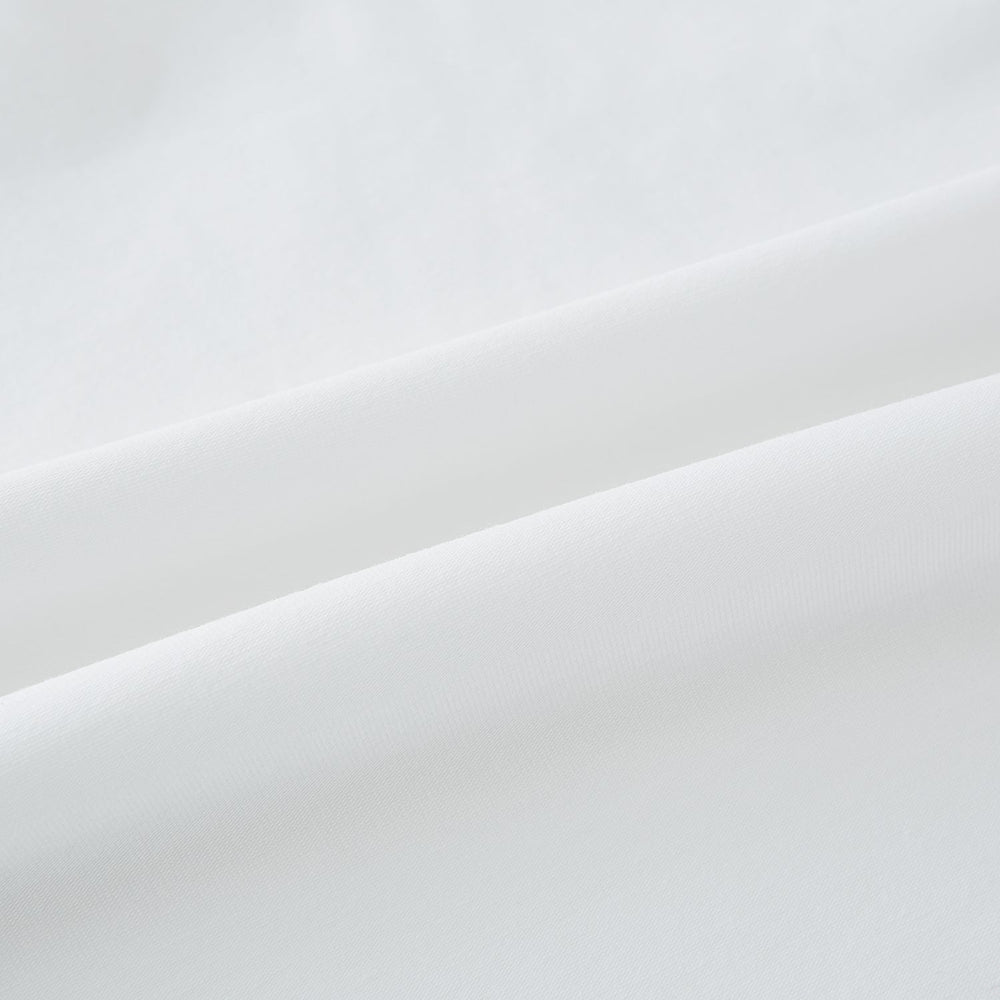 The Turnbull & Asser White Short-sleeve Pyjama Shirt is shown laid flat on a white background, featuring a plain, logo-free design for effortless comfort and classic loungewear style.