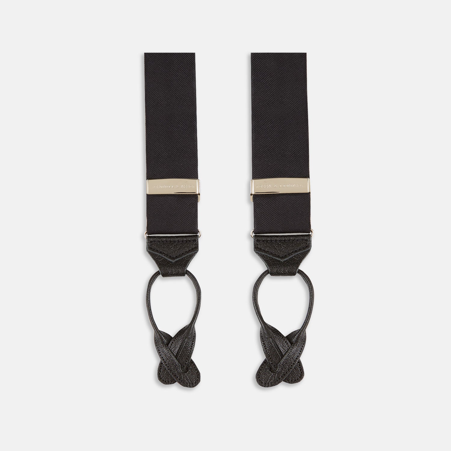 The Turnbull & Asser Black Herringbone Adjustable Silk Braces feature leather button loops and silver metal clips, shown on a white background—an elegant accessory to elevate any outfit.
