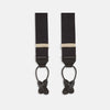 The Turnbull & Asser Black Herringbone Adjustable Silk Braces feature leather button loops and silver metal clips, shown on a white background—an elegant accessory to elevate any outfit.