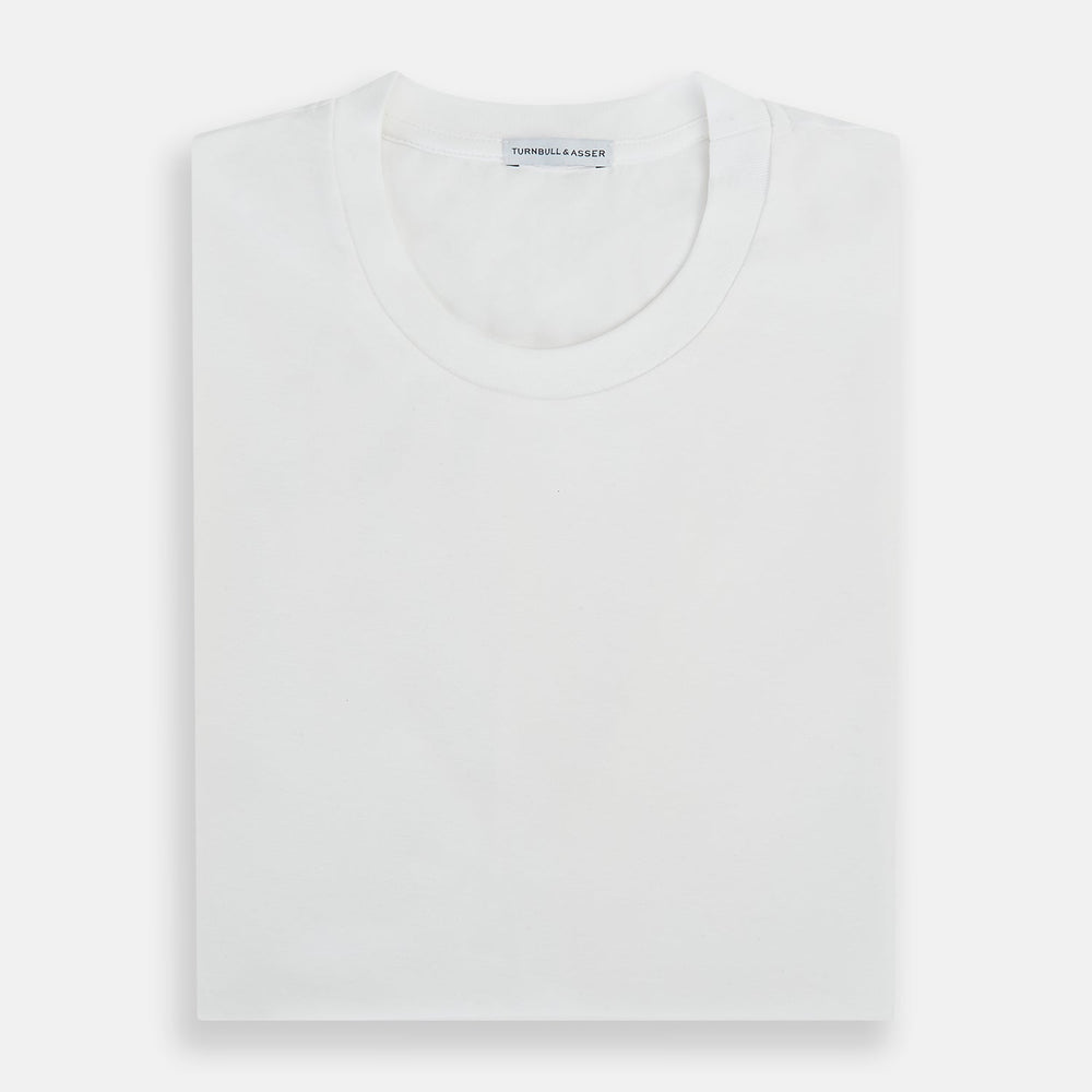 The Turnbull & Asser White Short-sleeve Pyjama Shirt is shown laid flat on a white background, featuring a plain, logo-free design for effortless comfort and classic loungewear style.