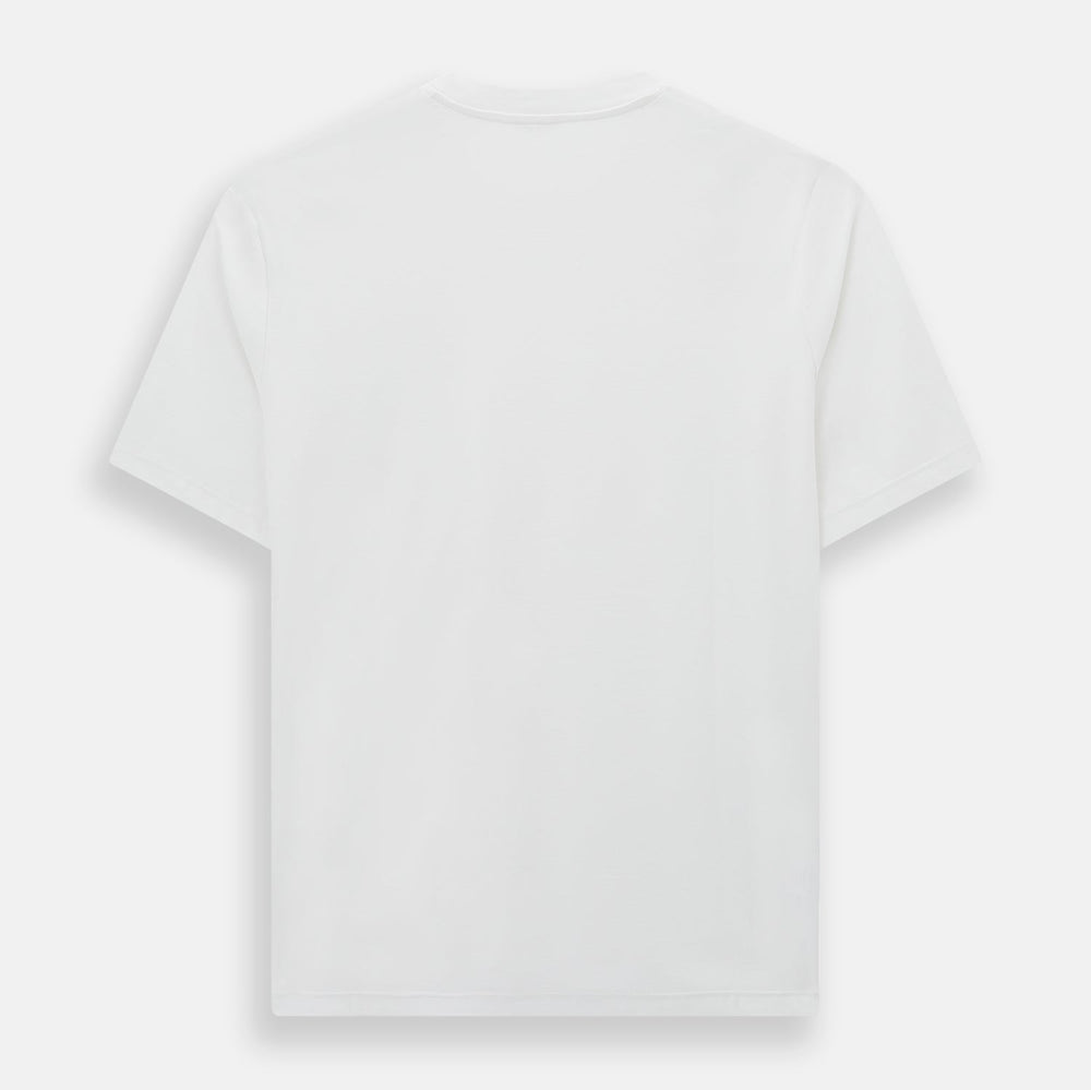 The Turnbull & Asser White Short-sleeve Pyjama Shirt is shown laid flat on a white background, featuring a plain, logo-free design for effortless comfort and classic loungewear style.